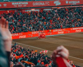 people cheering during soccer match