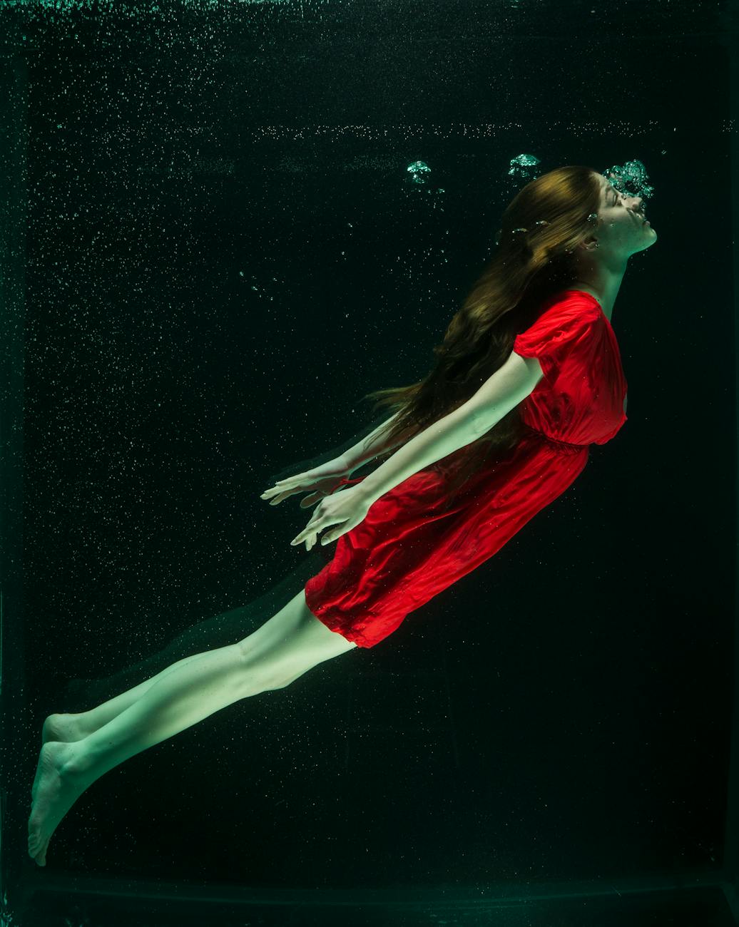 woman wearing red dress