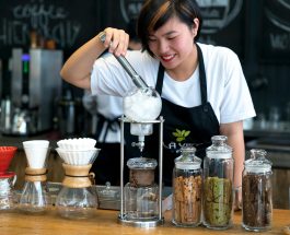 woman preparing ice cream in bar