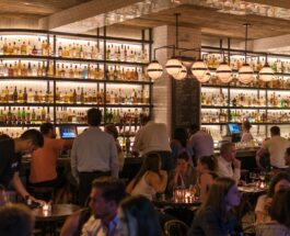 group of people gathering inside bar