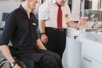 men using tablet computer on the kitchen counter top