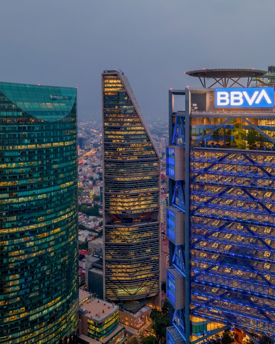 aerial view of illuminated skyscrapers in downtown mexico city mexico