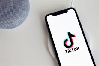 a cellphone with logo on the screen